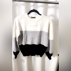 Size medium. Very soft, cozy, and warm striped sweater. Perfect condition